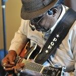 Clyde "Pop" Ferguson Sr. plays and sings the blues at Sister Futs Cafe in Lenoir.