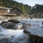 The Nantahala River runs past the NOC Outfitter’s Store on a summer day, providing a scenic break for passer-bys and visitors in the Nantahala Gorge. Photo credit Steven McBride